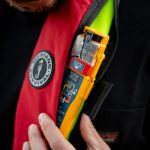 Stay protected at sea with rescueME PLB3 AIS Personal Locator Beacon attached to a lifejacket